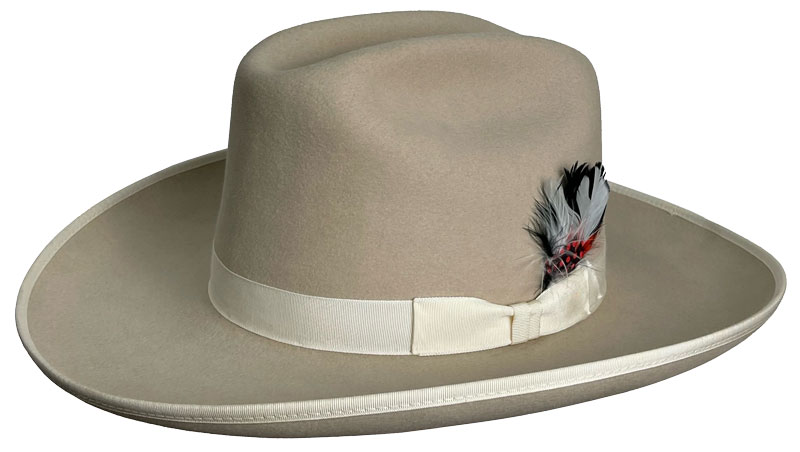 215F CATTLEMAN sand color hat with clear ribbon hatband and black and grey feathers